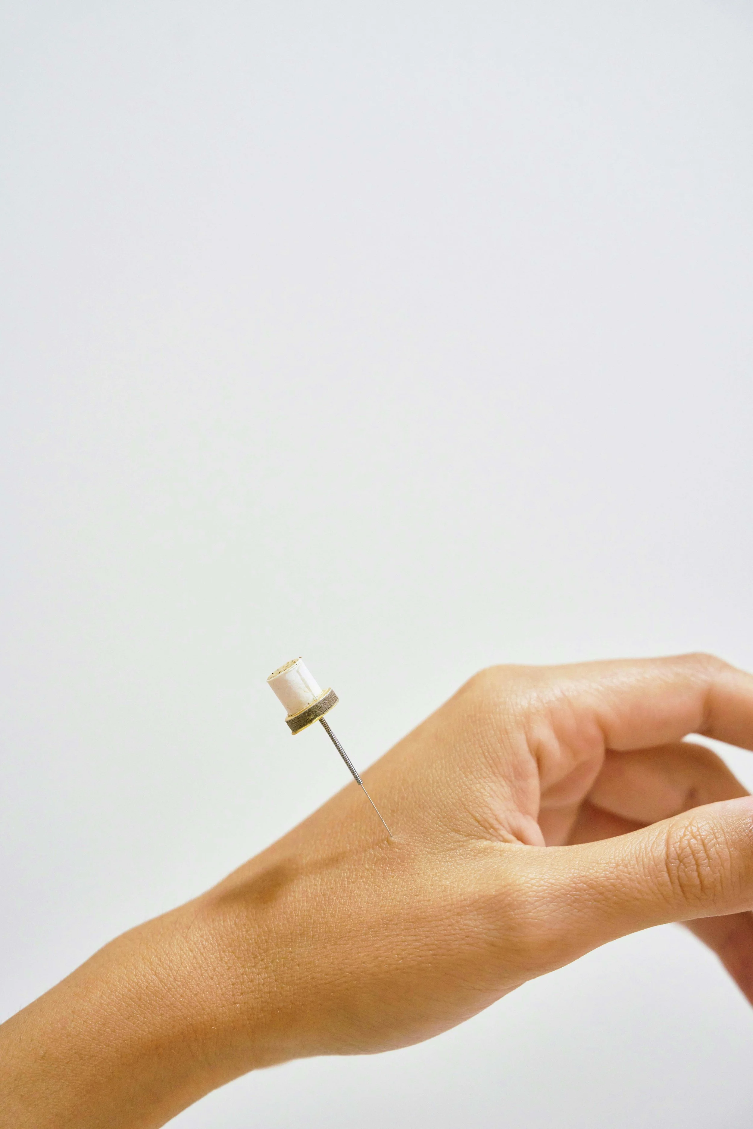Acupuncture needle in hand