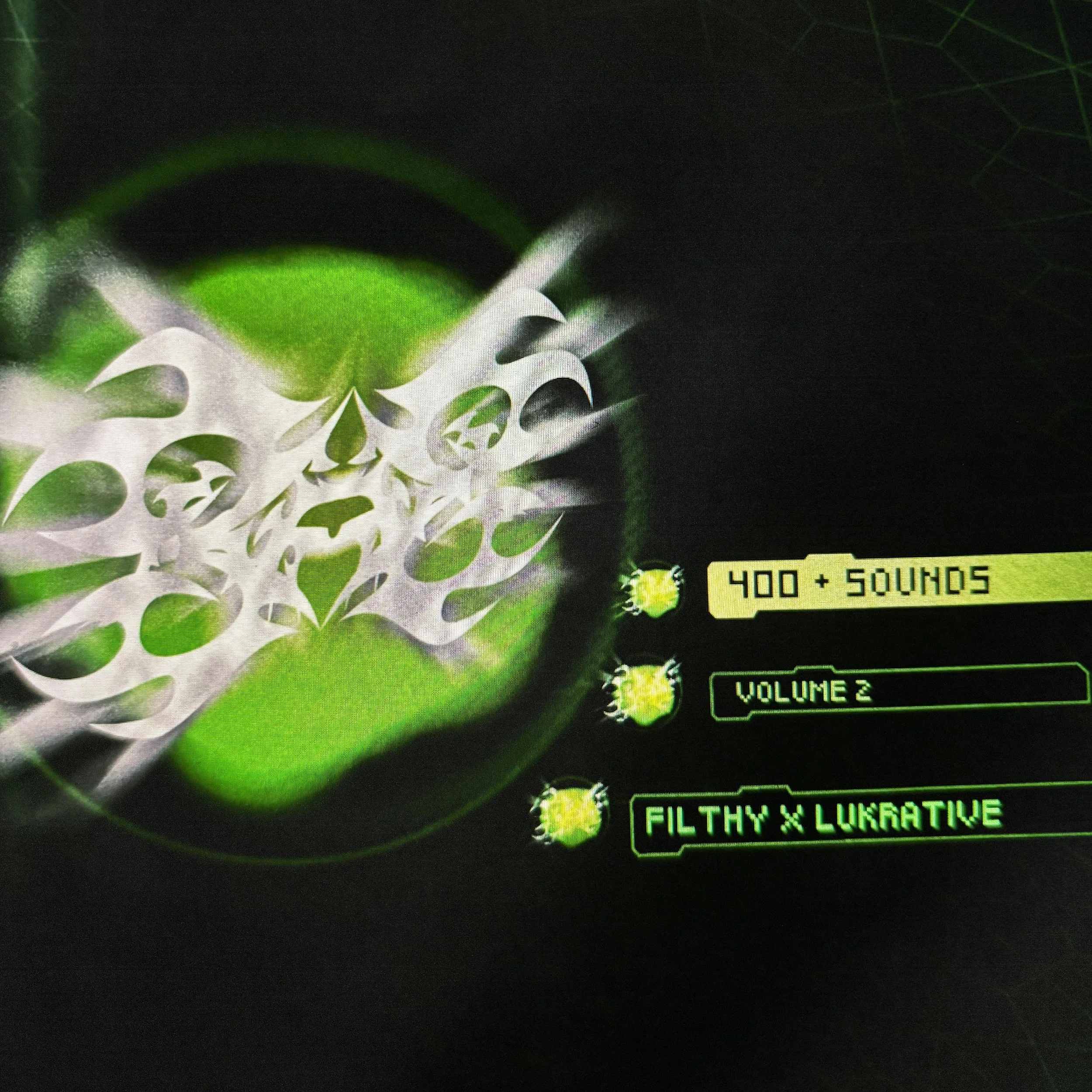 A person wearing a camo face mask and a white t-shirt holding a large plastic bottle of orange Fanta soda.