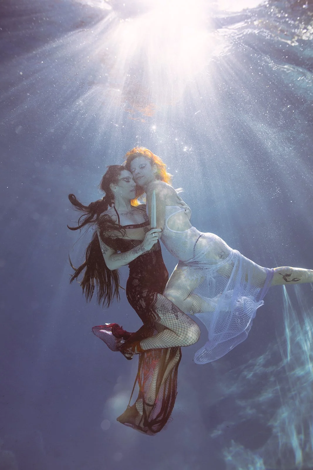 Raven & Mil Underwater.jpg