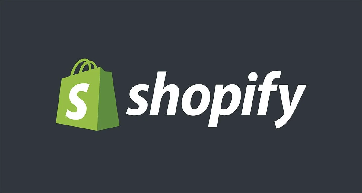 Shopify logo with a green shopping bag and a white 'S' on it, alongside the word 'shopify' in lowercase letters.