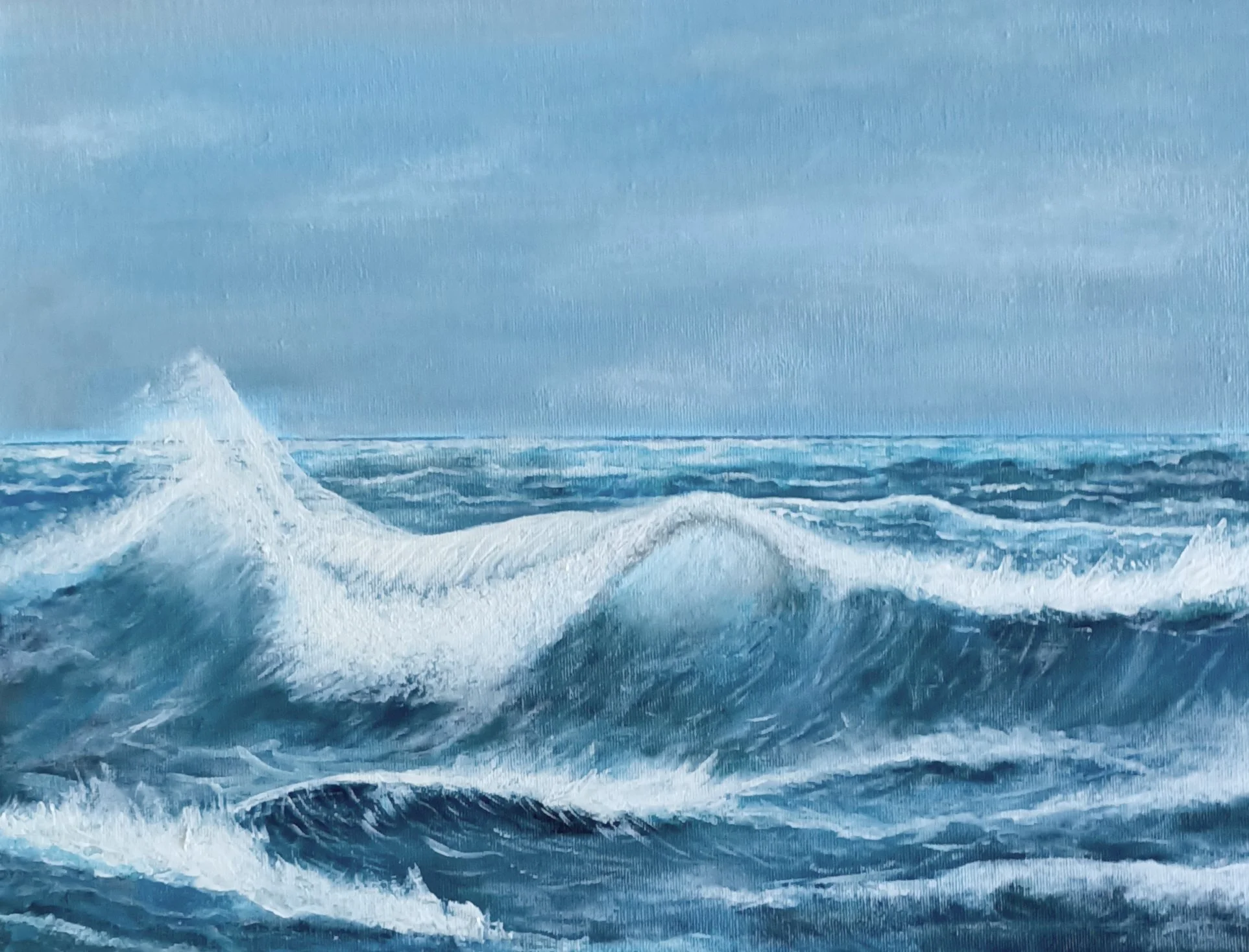Contemporary ocean painting featuring a powerful breaking wave with white foam and layered blue water beneath a pale overcast sky, acrylic on canvas seascape.