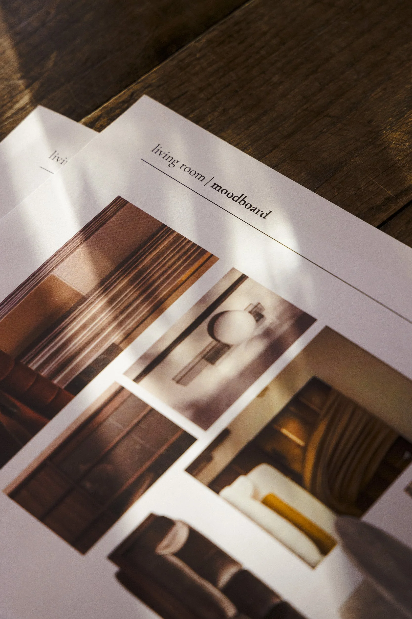 A home decor mood board featuring pictures of wooden furniture, a modern white wall lamp, and cozy interior design elements for a living room.