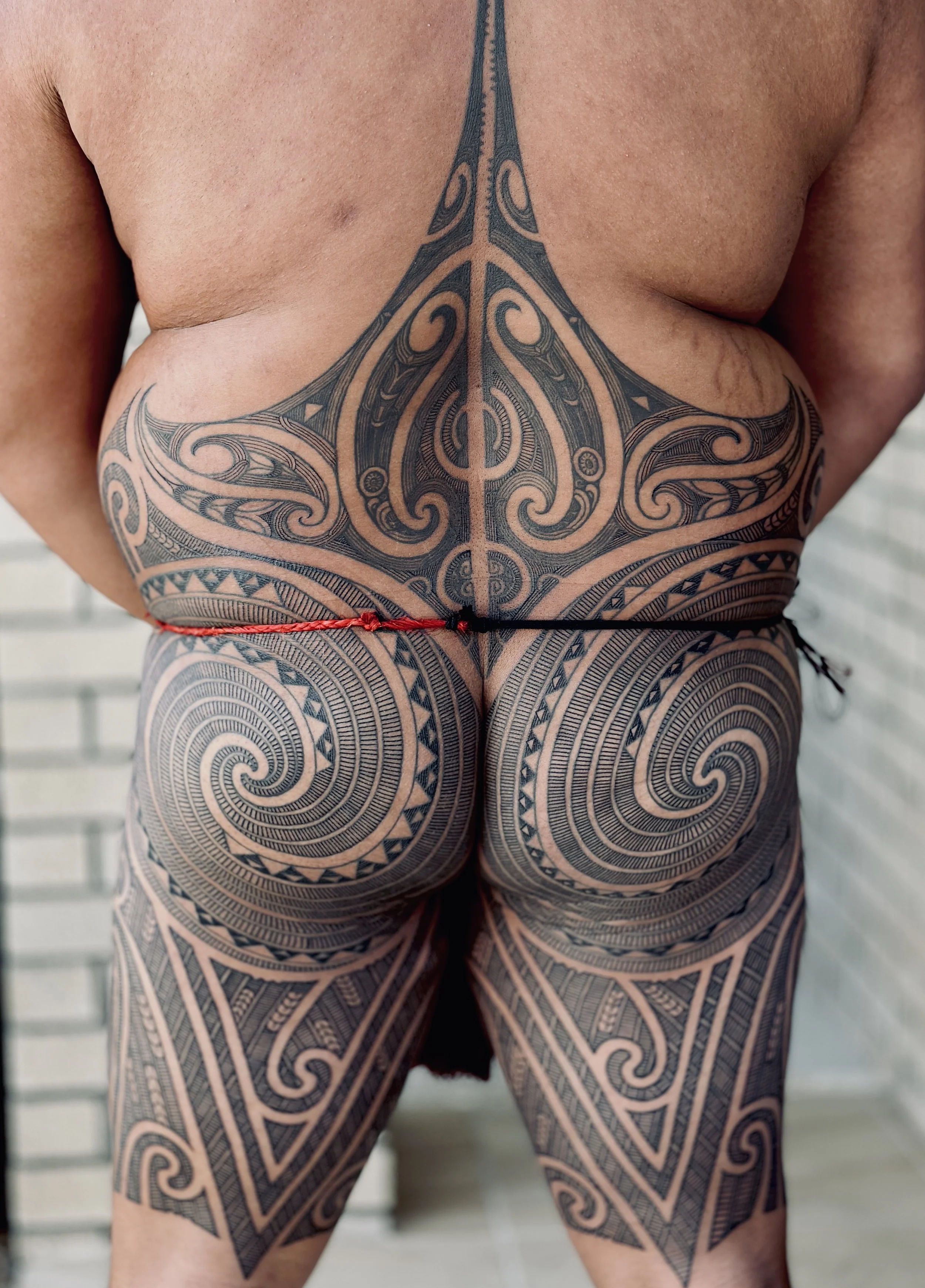 Ta Moko Puhoro by Maori artist Turumakina