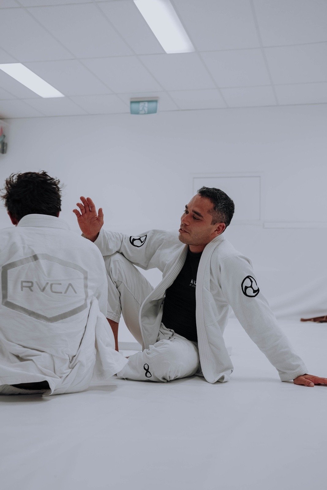 Private one-on-one Brazilian Jiu-Jitsu coaching session at Kazoku Jiu Jitsu Academy in Varsity Lakes