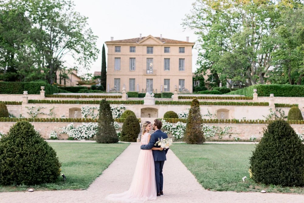 Luxury destination wedding at Château de la Gaude near Aix-en-Provence with formal gardens and sophisticated reception spaces