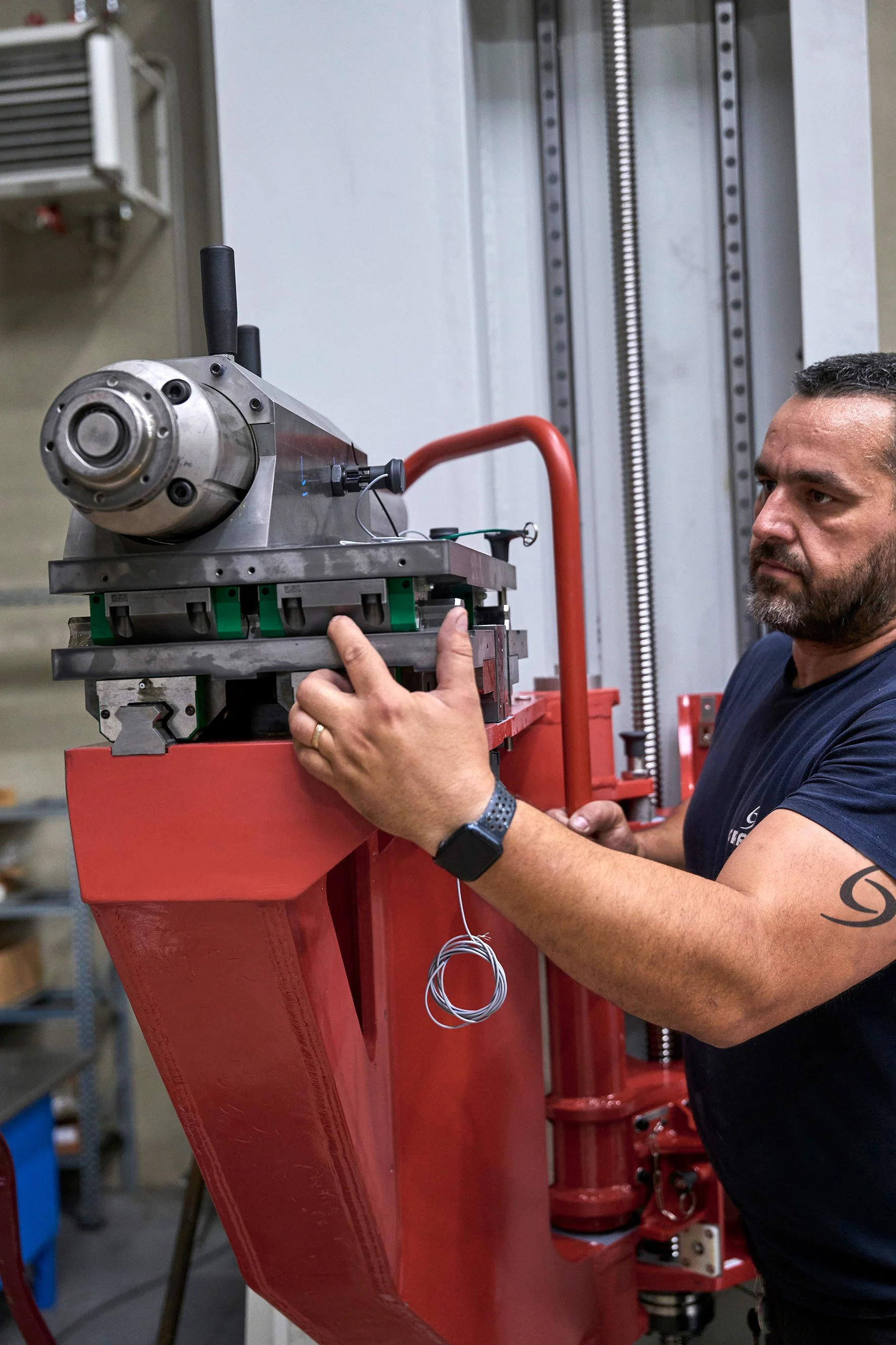 technician holding machine.jpg