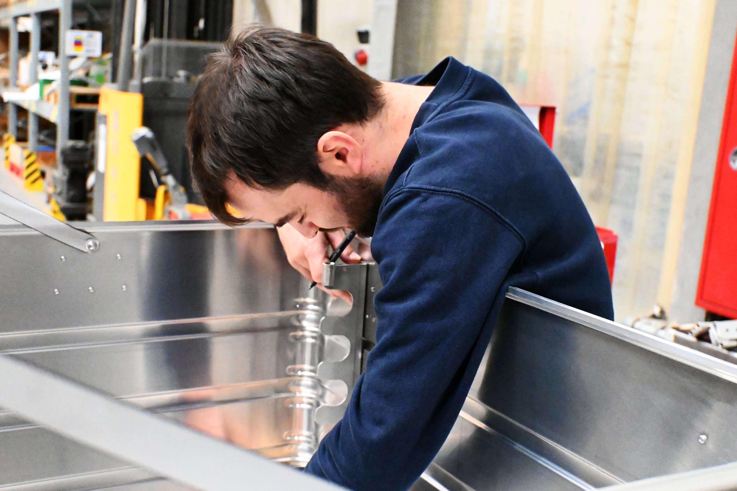 technician inspecting container.jpg