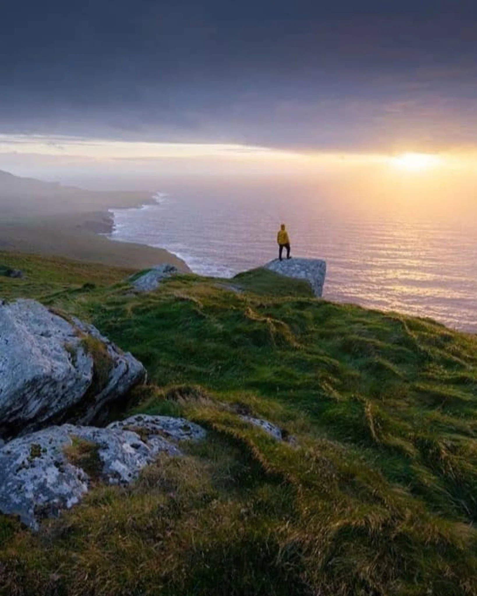 A moment of quiet, standing on the edge of it all.

Even on stormy days, Geokaun delivers &mdash; dramatic skies, crashing waves, and serious atmosphere. 💚

📸 @reubenfields

#GeokaunMountainAndCliffs #GeokaunMountain #ValentiaIsland #SkelligCoast #