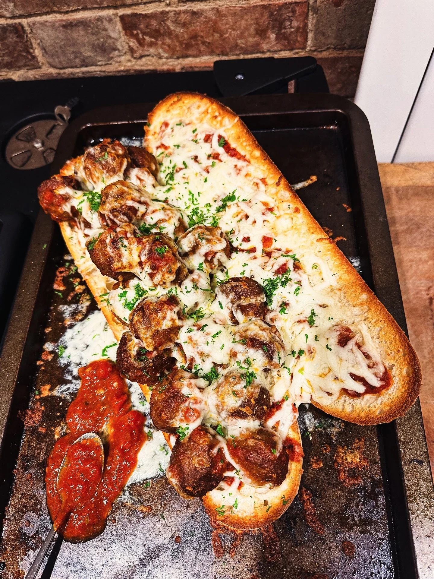 Not being a massive takeaway guy but wanting something a little bit naughty on a Friday night with a cold beer, I give you the meatball sub.
A ciabatta lightly toasted and rubbed with garlic. My tomato and nduja sauce. Meatballs loaded with mozzarell