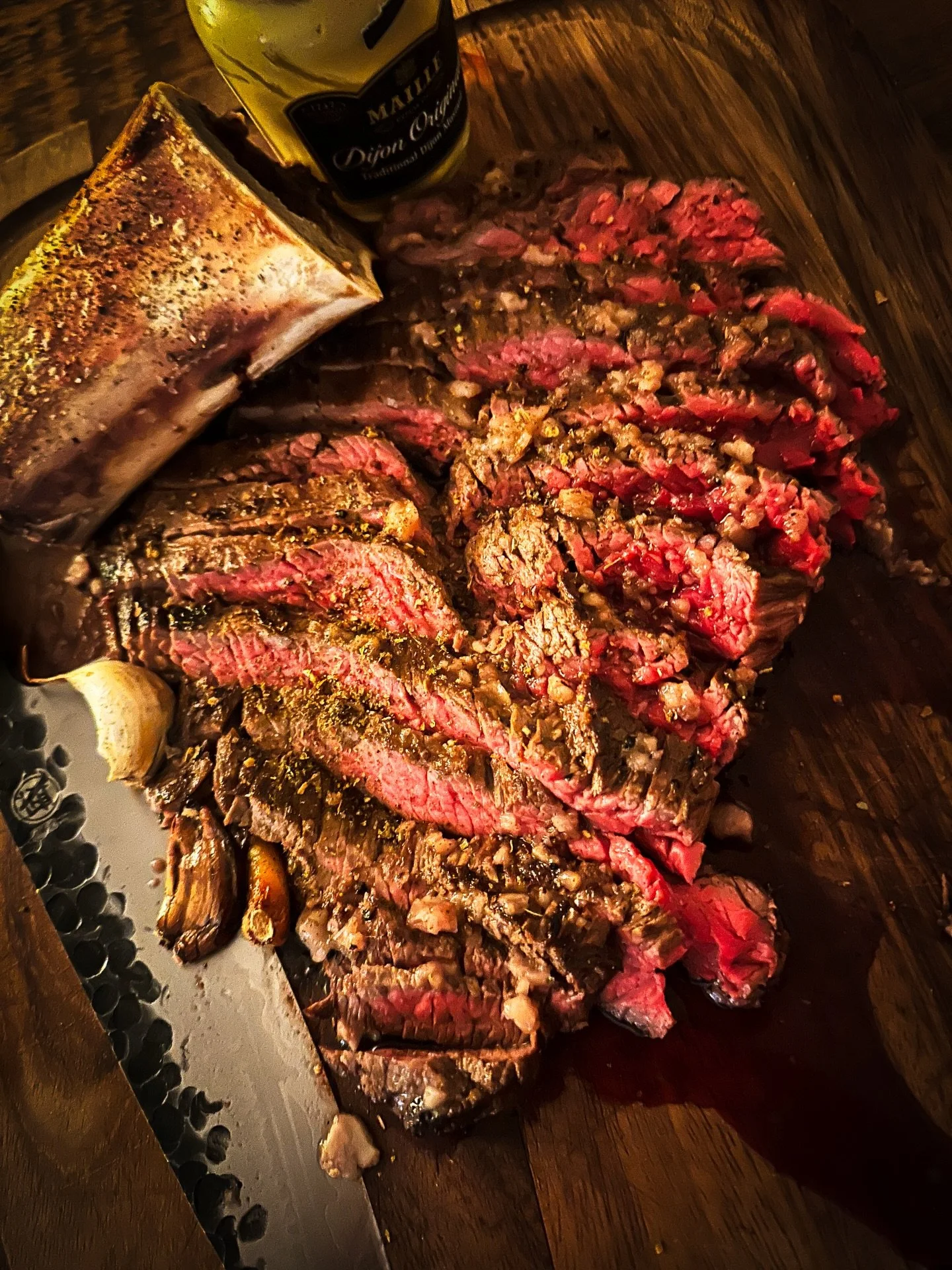 About last night&hellip;&hellip;steak night, specifically bavette steak, hard seared in the skillet.
Bone marrow melting down, basting every inch.
Rested properly. Sliced thick, a sprinkle of salt and pepper.
Red wine poured while the pan&rsquo;s sti
