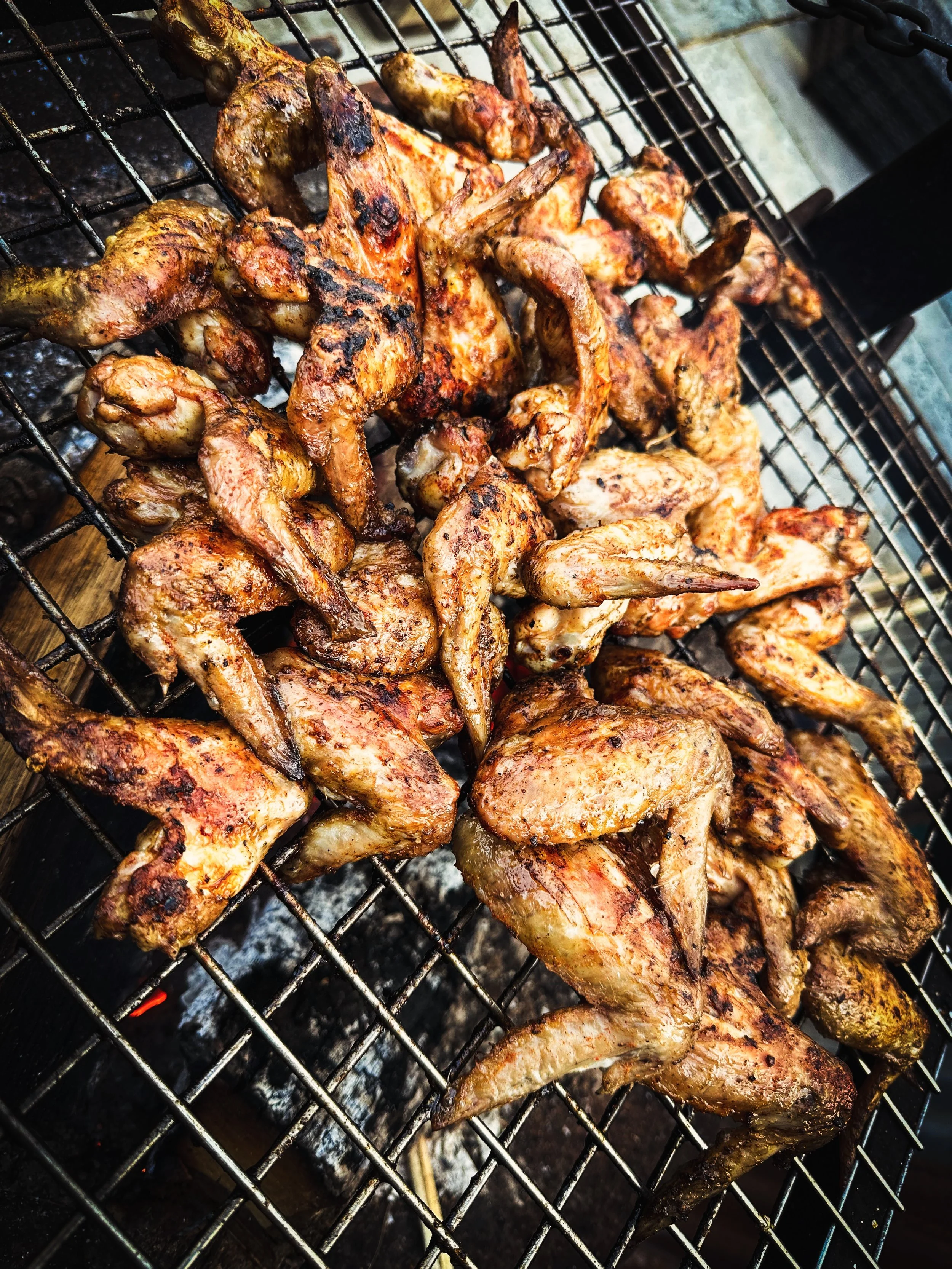 Saturday nights are made for fire, wings and cold beer.

No reservations. No dress code. Just smoke in the air, a pile of sticky wings, and a couple of cold ones by the flames.

Sometimes the best nights are the simple ones &mdash; cooking outdoors, 