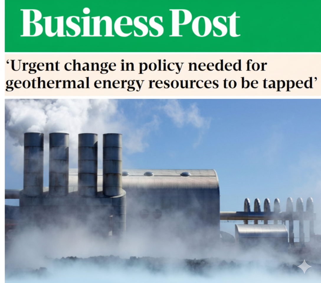 An industrial facility with multiple smokestacks emitting smoke and vapor, with a blue sky and some clouds in the background.