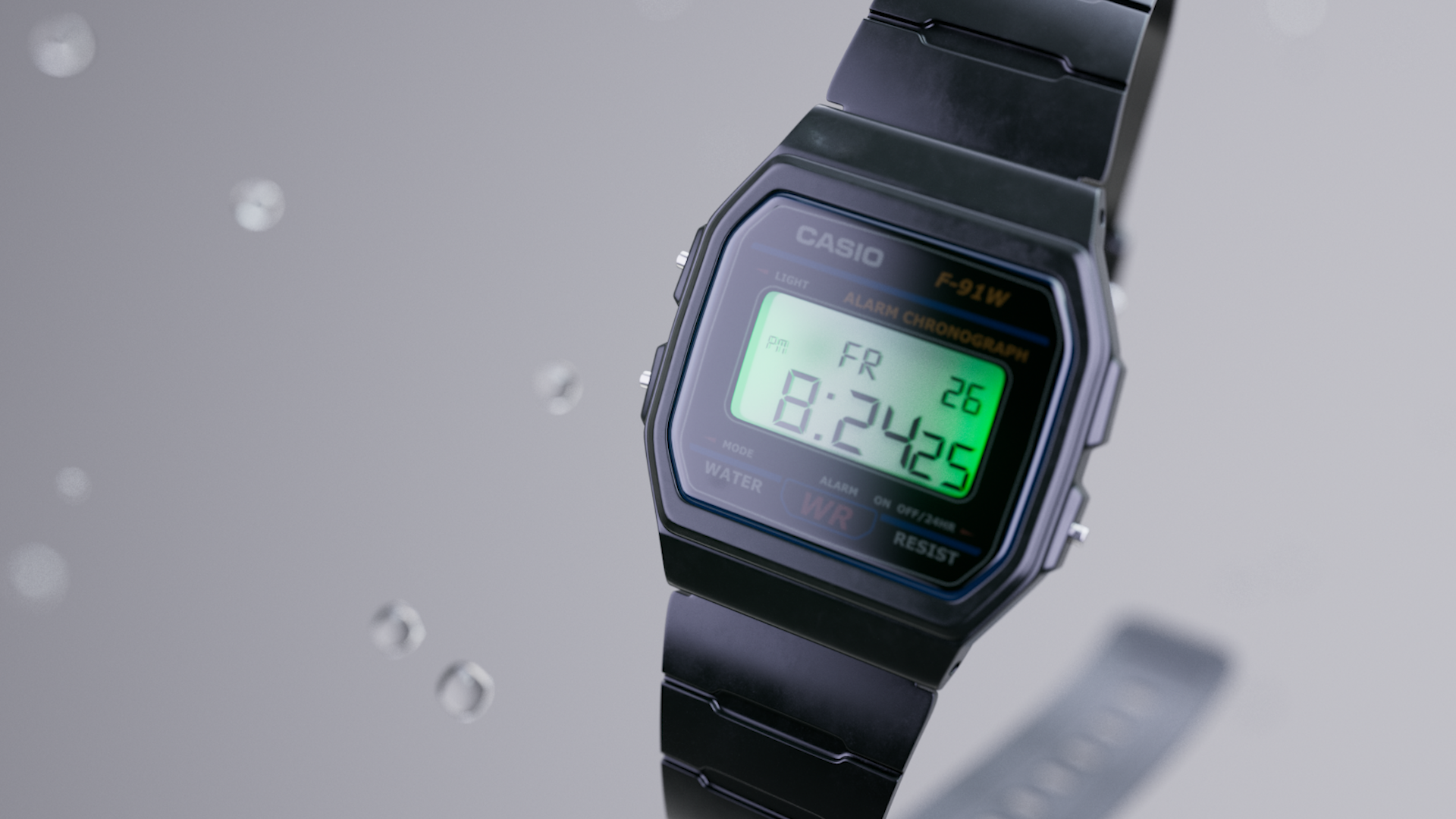 Digital Casio watch with a green backlit display showing the time 8:24:25, date 26, and day FR, placed on a reflective surface with water droplets.