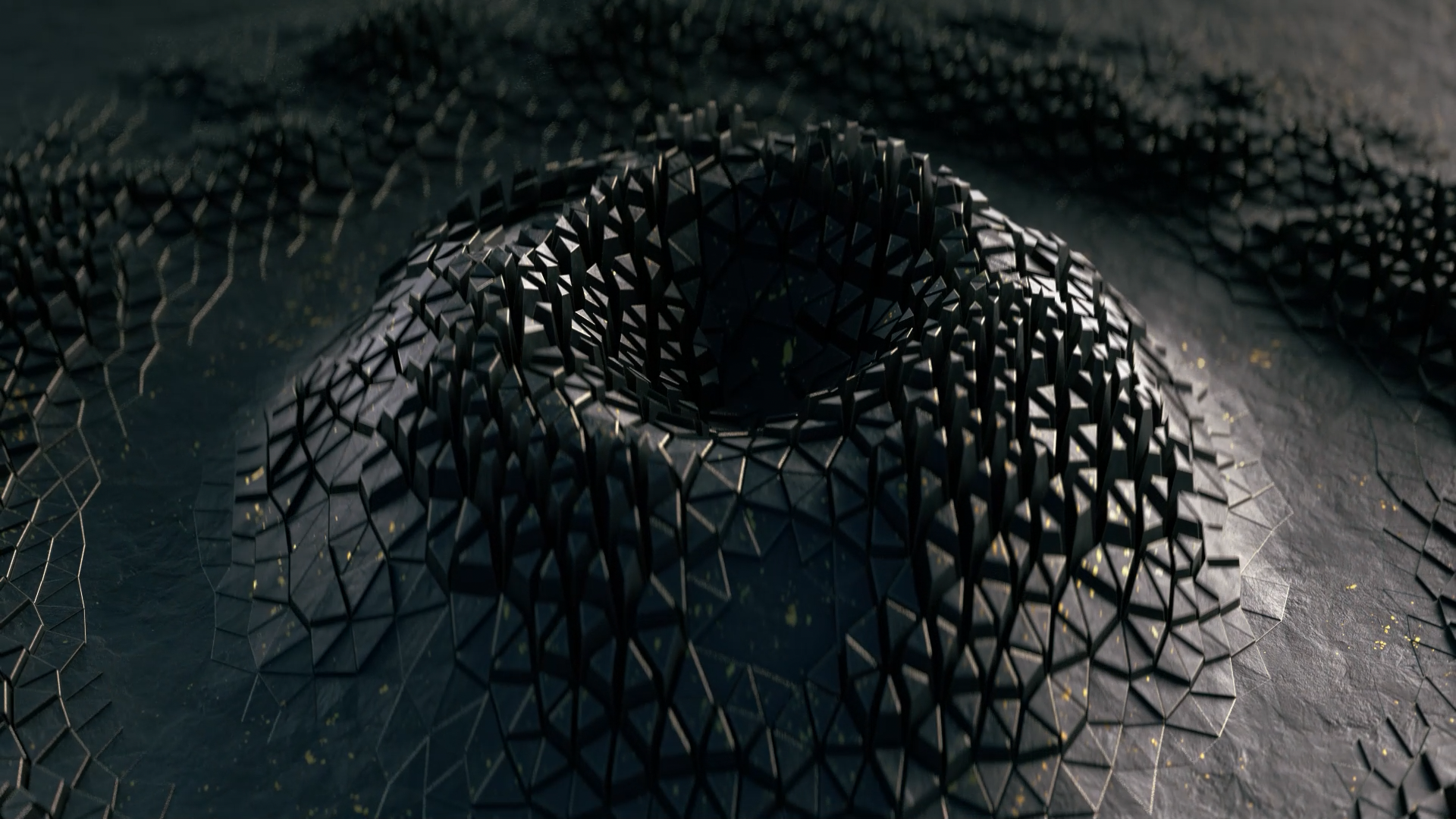 Close-up of an abstract geometric sculpture made of black interconnected hexagonal shapes, forming a layered spindle shape on a dark textured surface.
