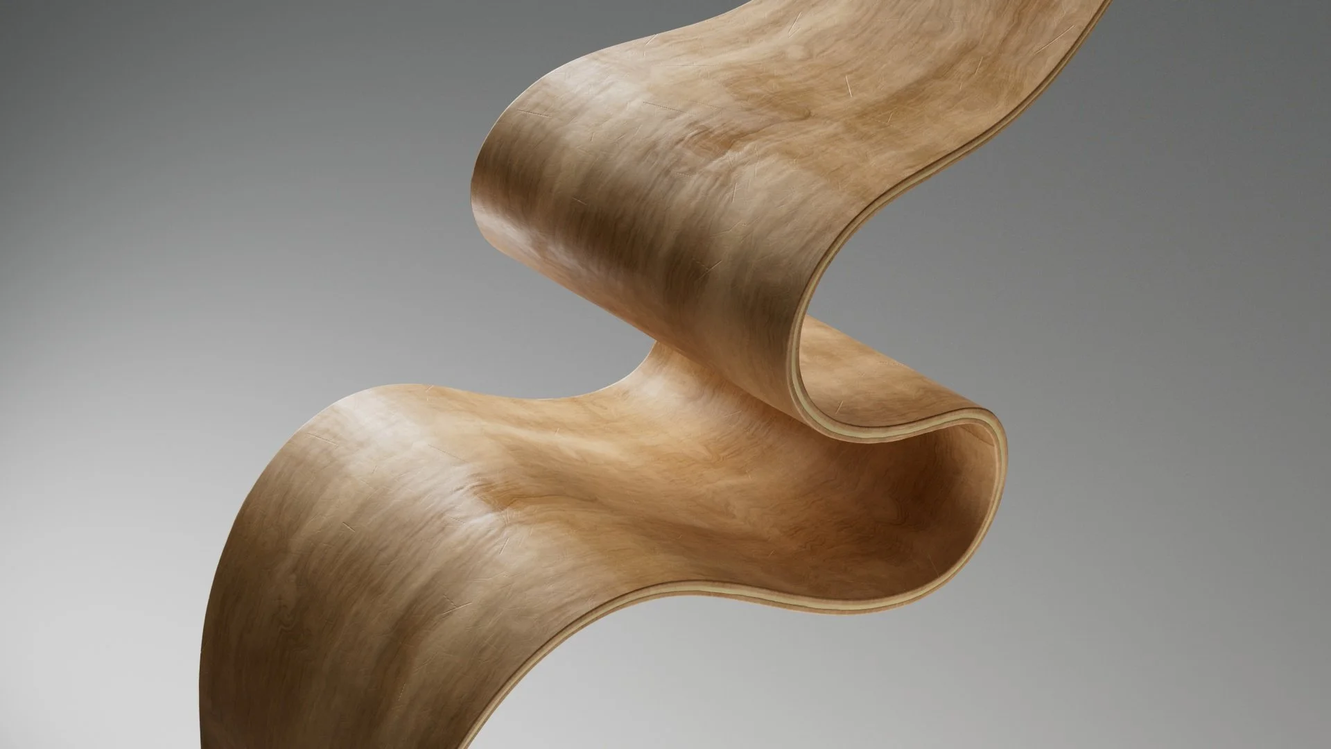 A close-up image of a modern, abstract wooden sculpture with smooth, curved, flowing lines and a natural wood finish against a plain gray background.