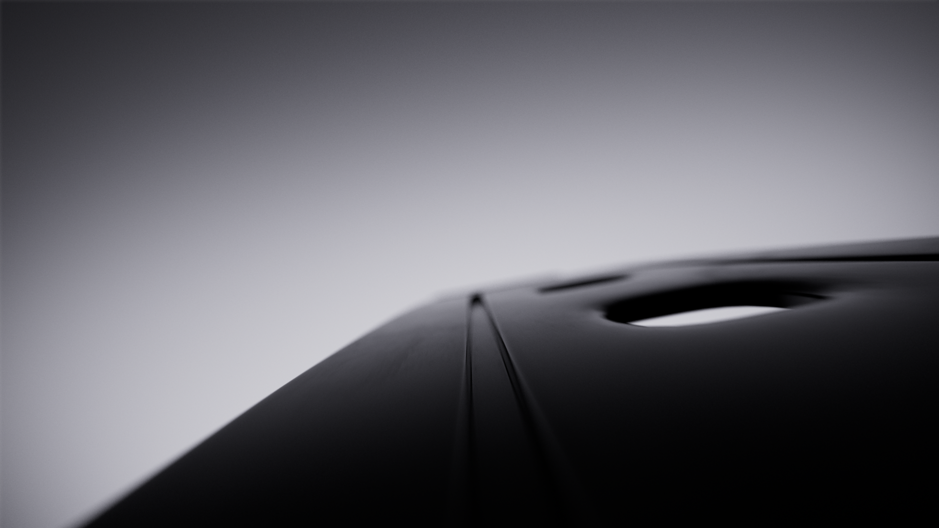 Close-up of a sleek, black casio watch, against a blurred, gray background.