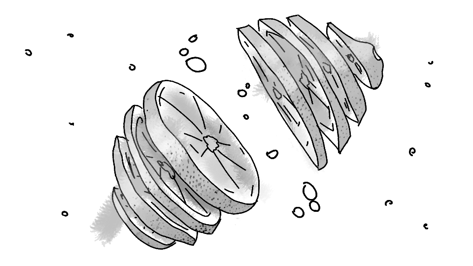 A sliced lemon floating underwater with bubbles around it.