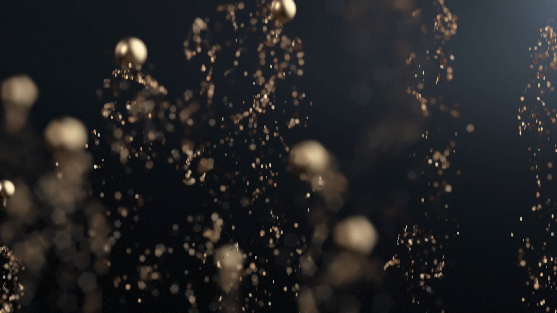 Close-up of floating gold and white particles and spheres against a dark background.