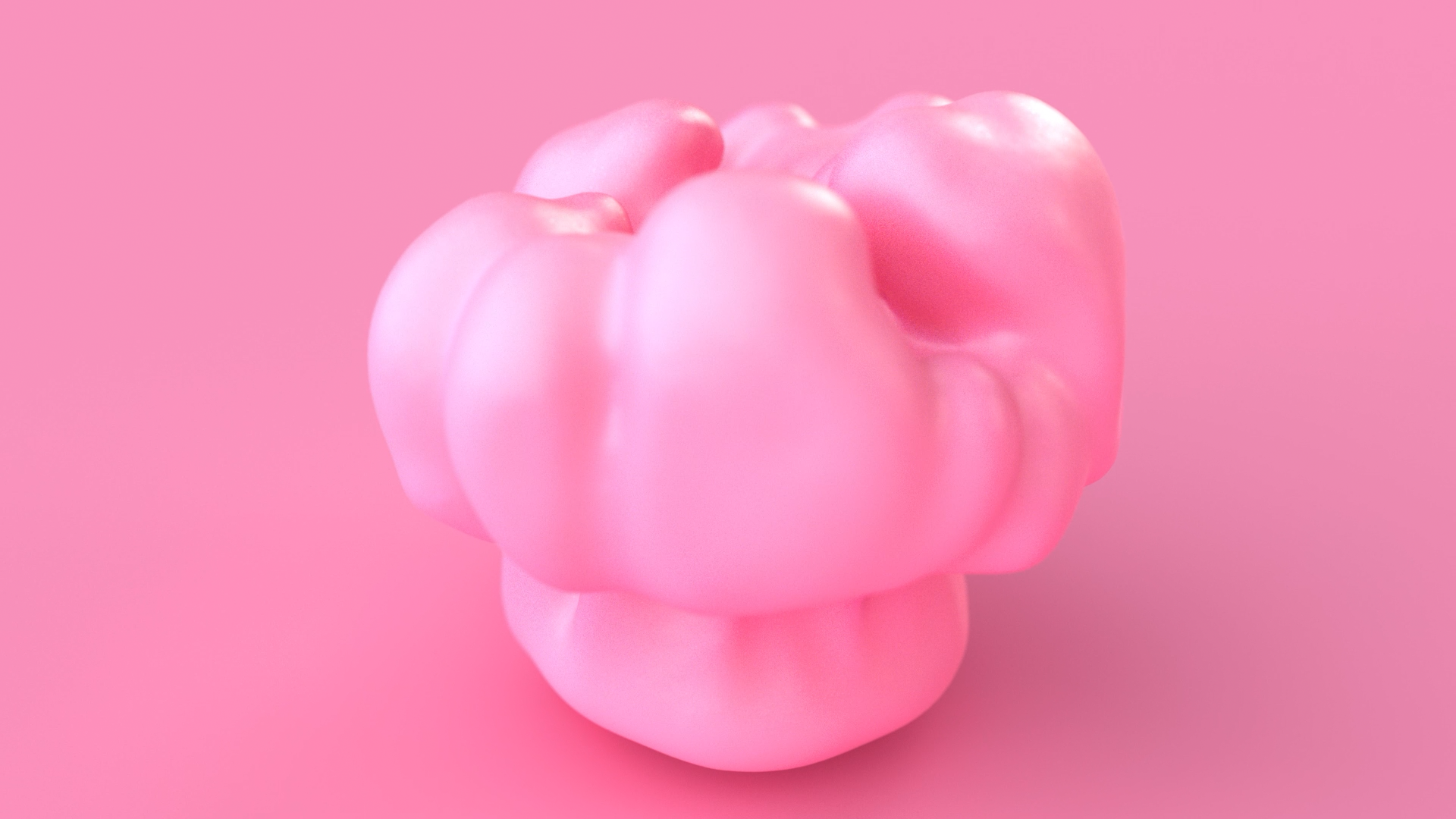 A pink soap shaped like a fluffy cloud on a pink background.
