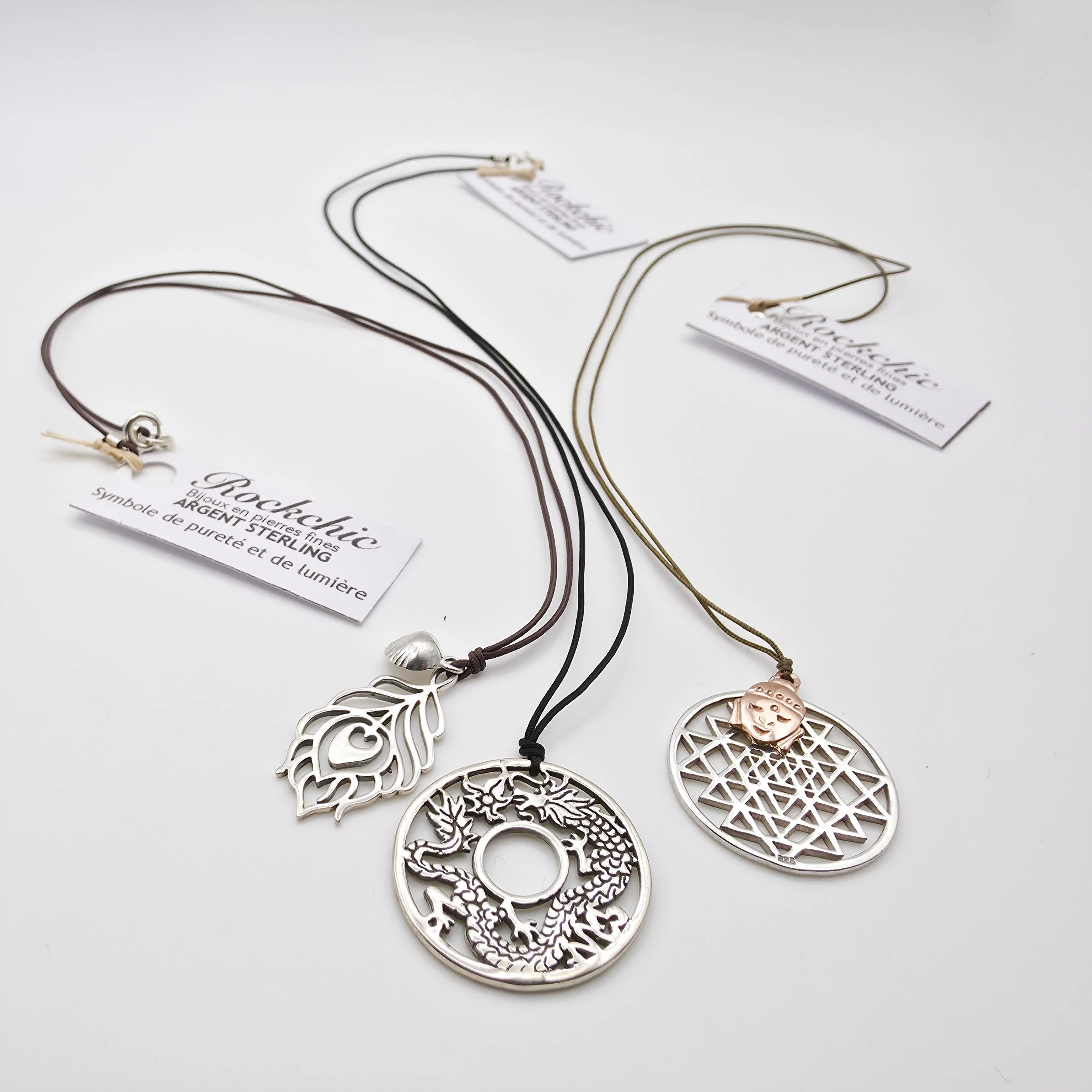 SILVER NECKLACES ON CORD