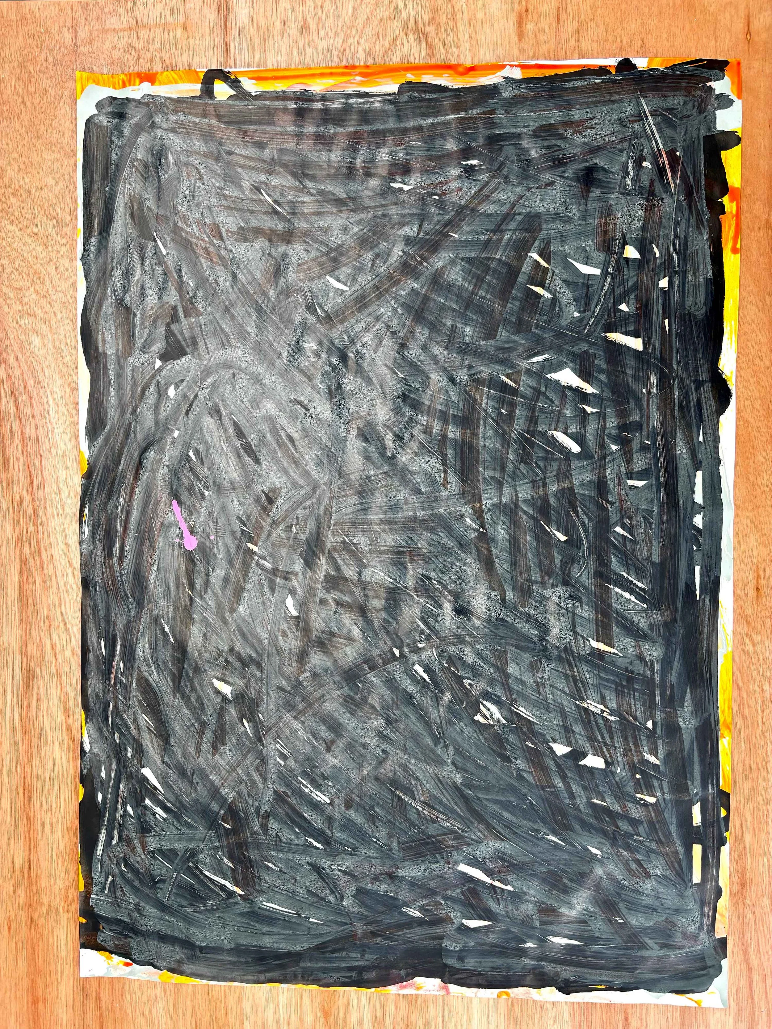 A painting with broad black brushstrokes on a white background, surrounded by a colorful border of yellow, orange, and pink paint.