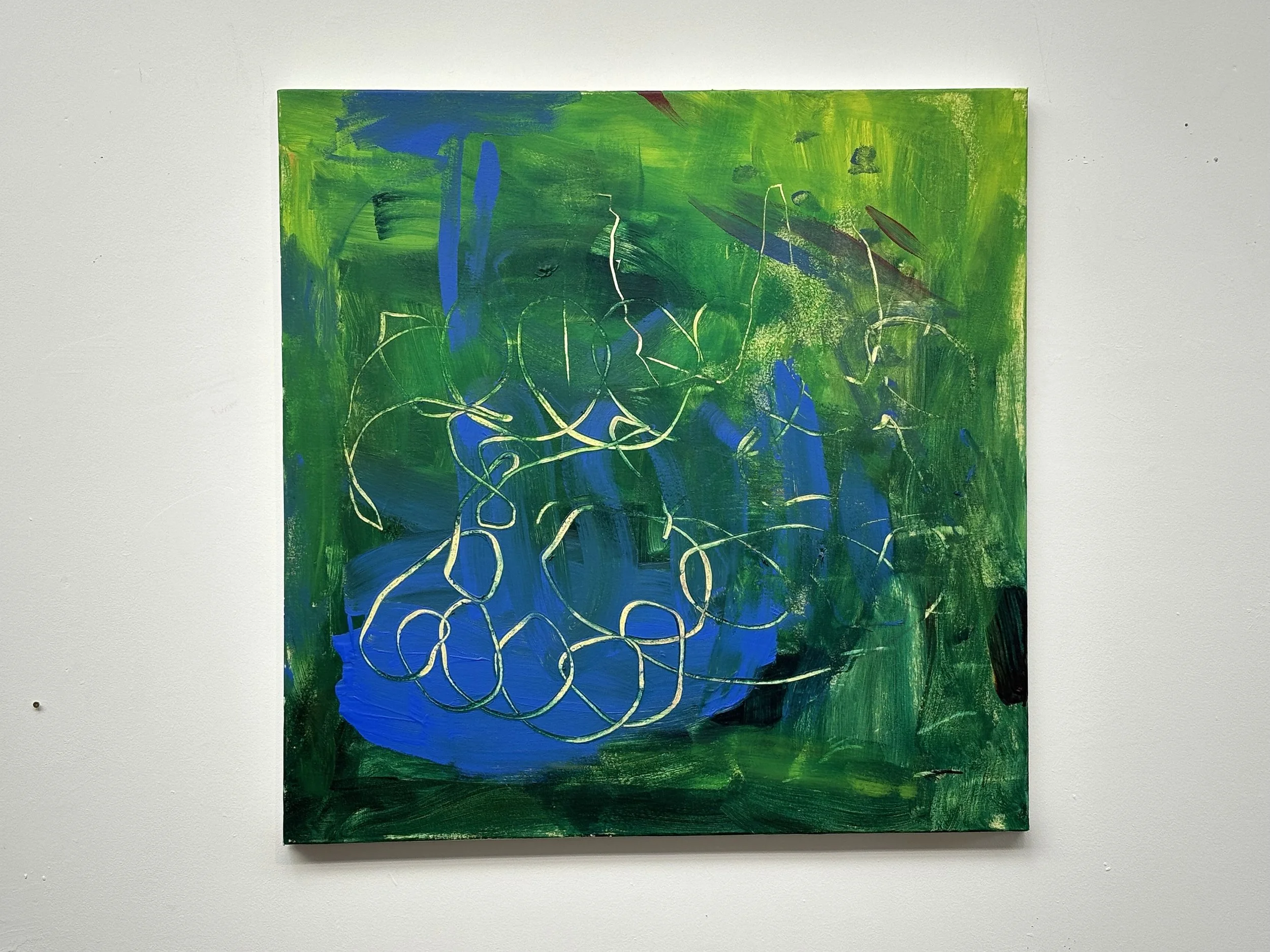An abstract painting featuring green and blue brushstrokes with white and dark lines on a canvas, displayed against a white wall.
