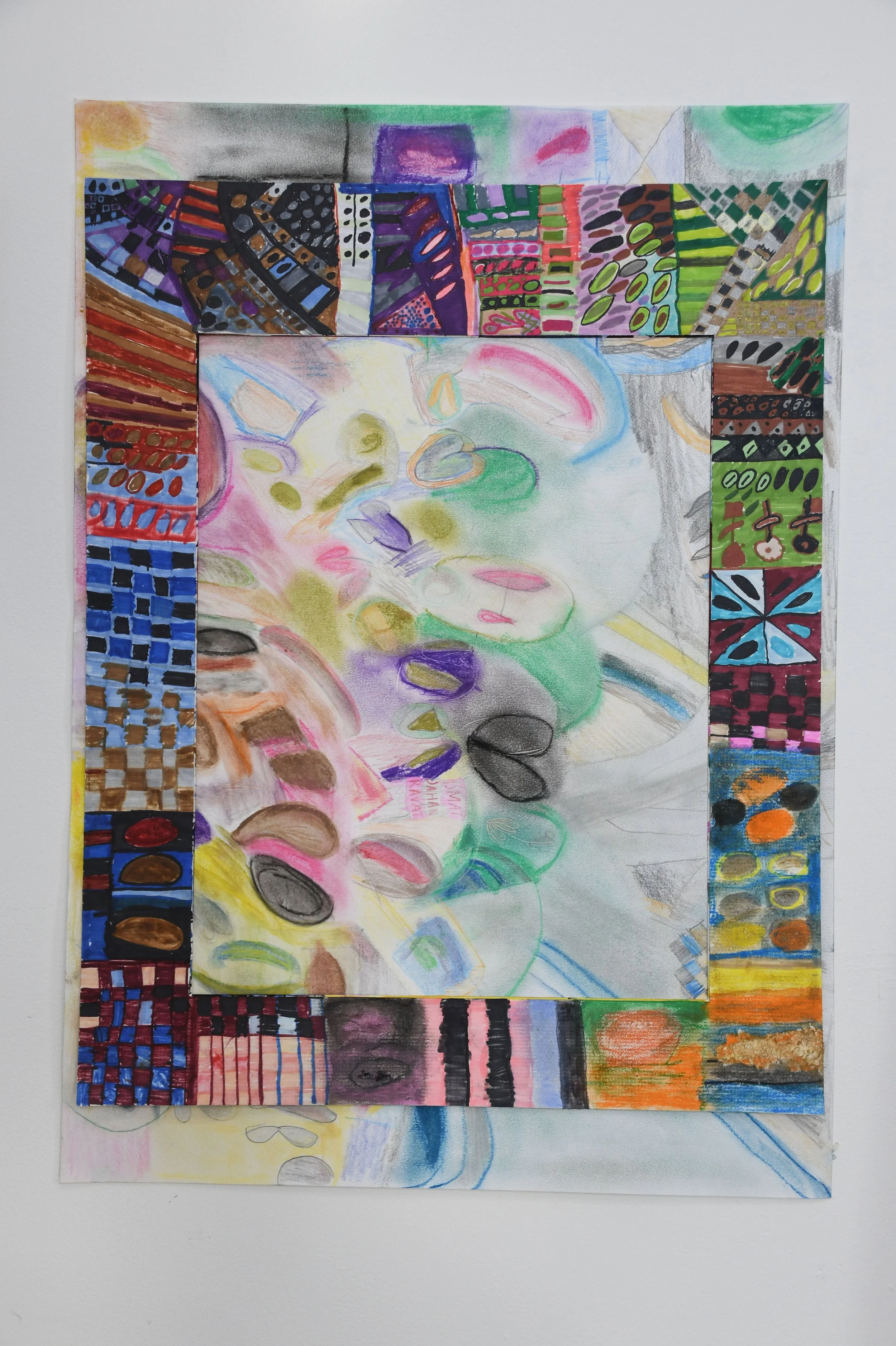 A colorful abstract drawing with a central white space surrounded by vibrant patterns and colors, including squares, circles, and lines in various shades of blue, red, green, purple, black, yellow, and gray.