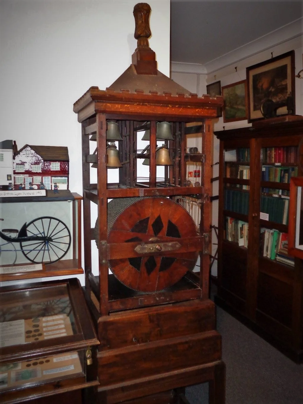 The interior of Henfield Museum featuring the Change 8 bell set in wood and glass which replicates the sound of church bells.