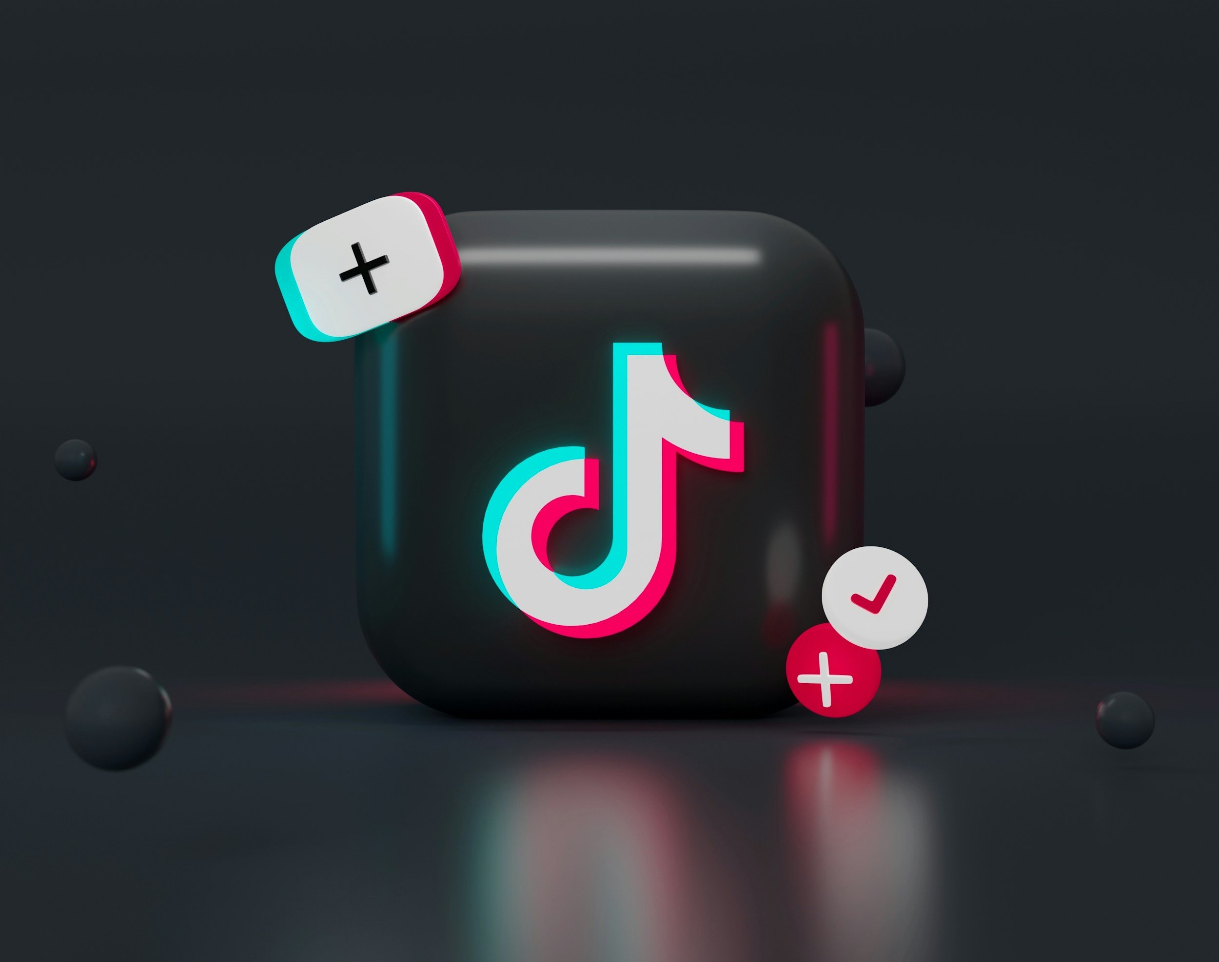Digital illustration of the TikTok app icon with floating notification icons including a plus sign, a checkmark, and a notification badge, set against a dark background.