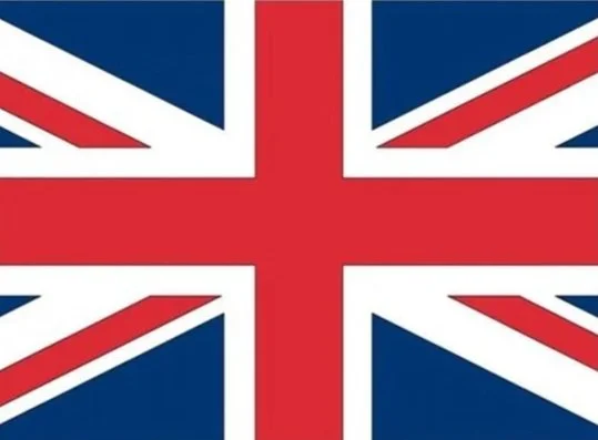 The flag of the United Kingdom, known as the Union Jack, with a red cross on a blue and white field.