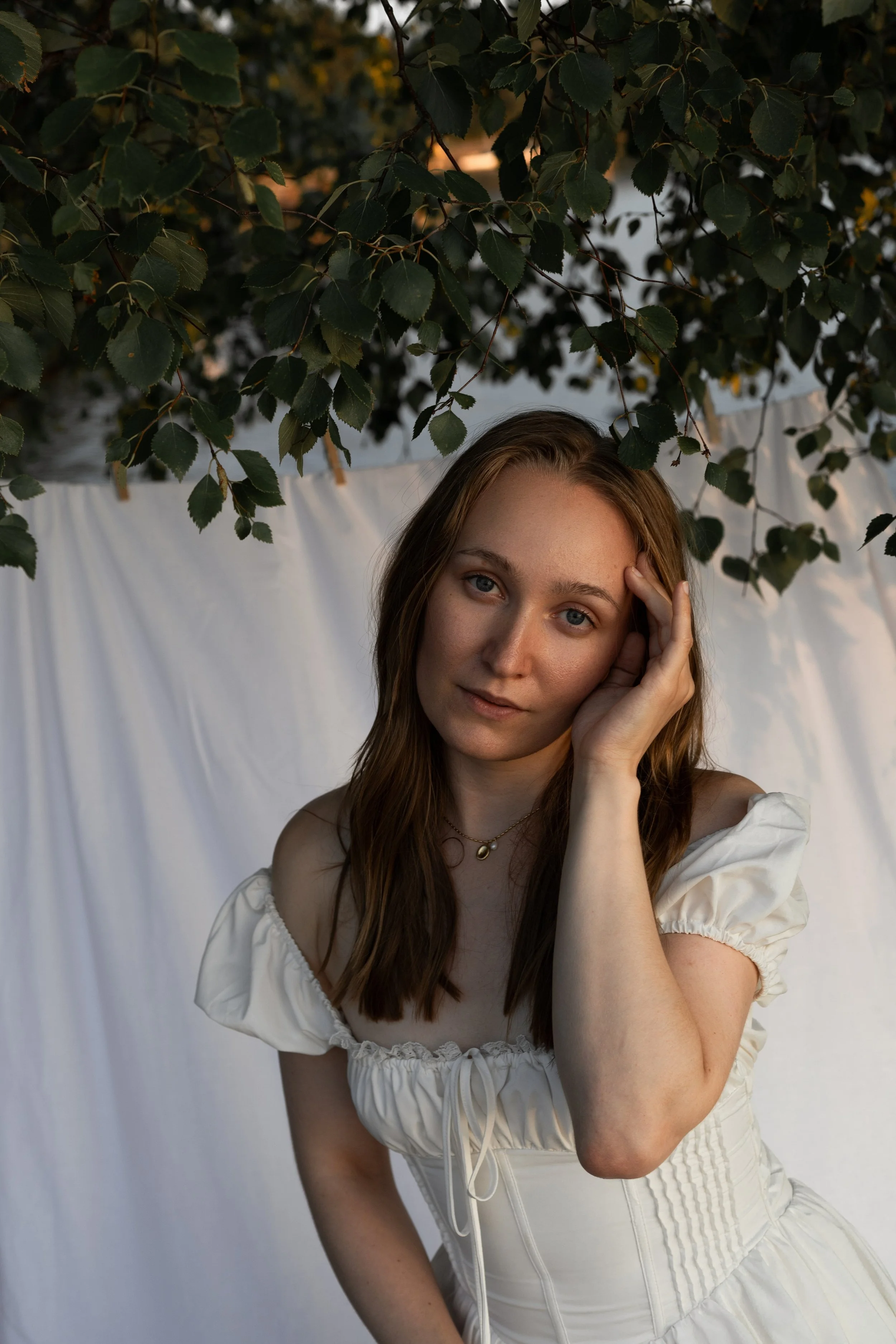 Soft content creator girl posing in Finnish nature on a Summer evening