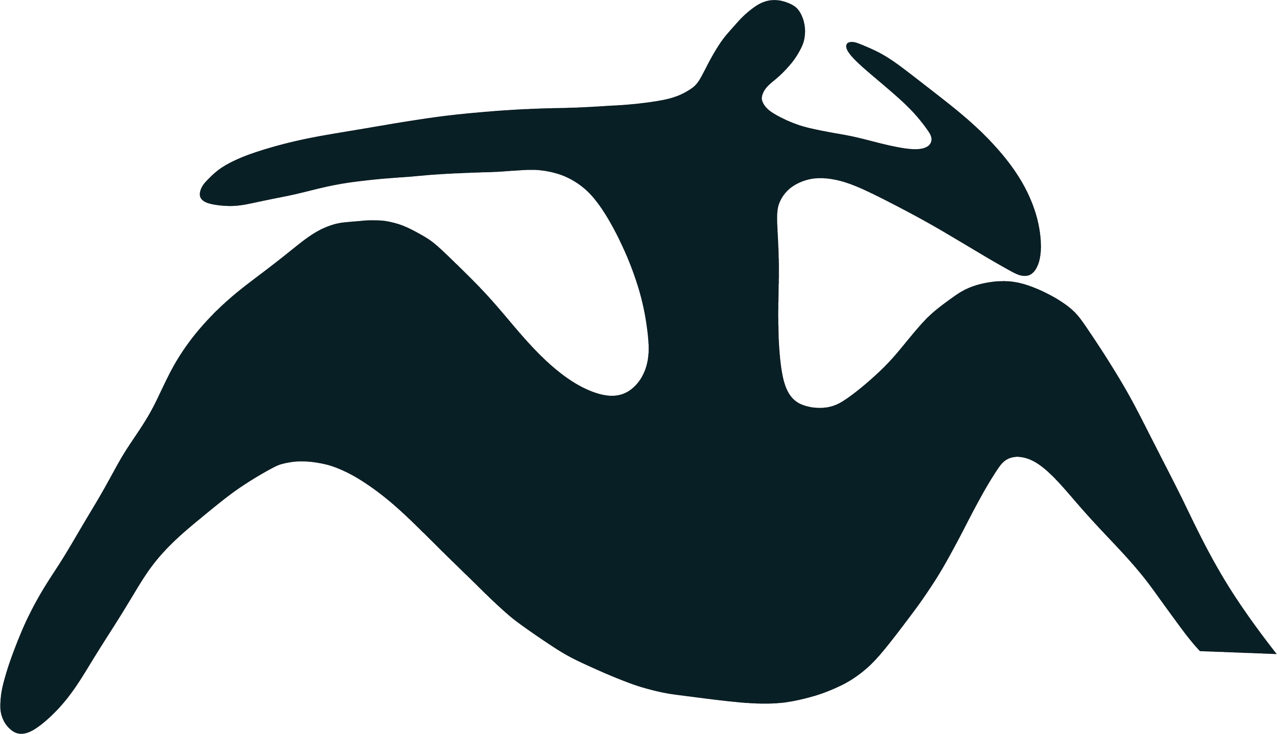 Silhouette of a person stretching their arms above their head in front of mountains.