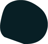 A simple, solid dark-colored circle.
