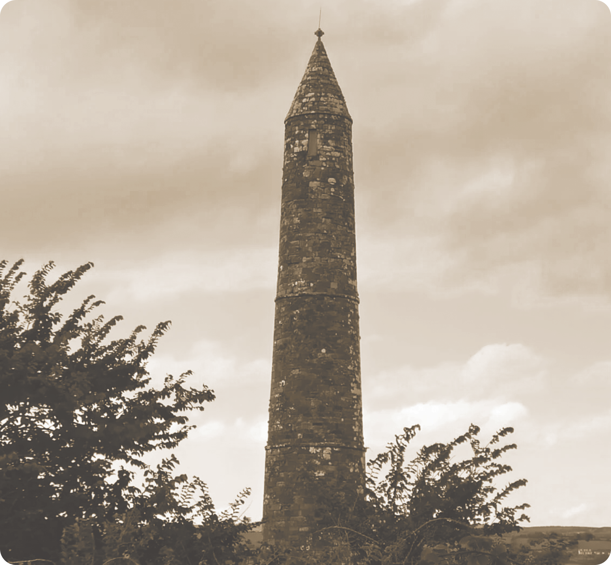 Sepia-tone photo of a tall, narrow stone tower with a conical roof, surrounded by trees and clouds in the sky.
