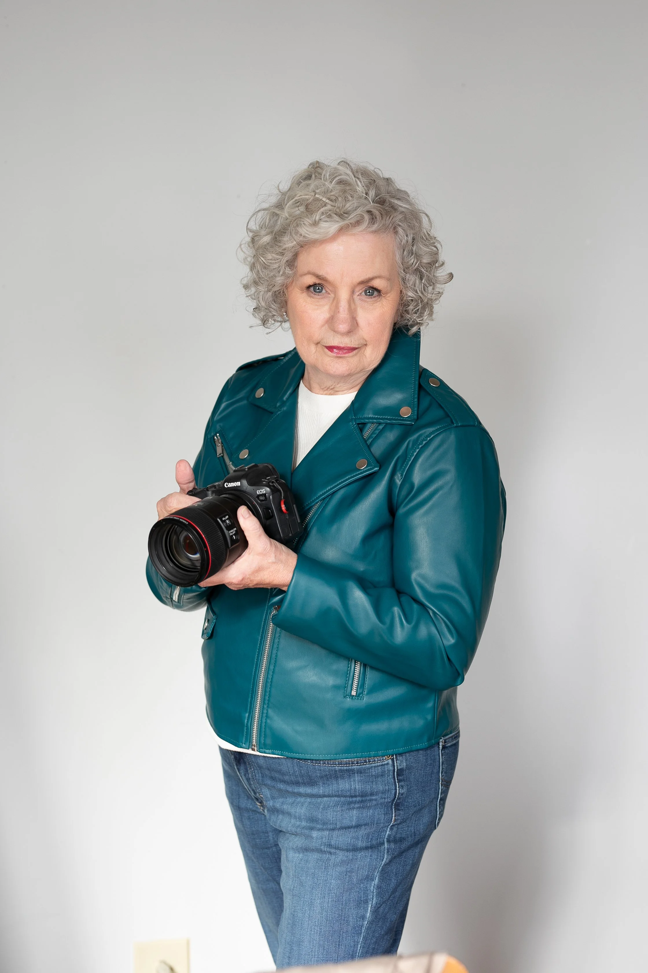 Amy Melendy holding her camera