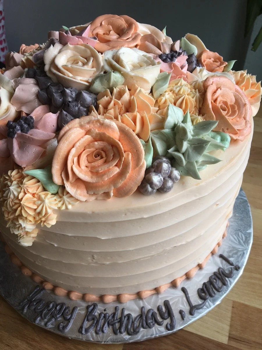 cake vs torte - intricately piped cake decorated with buttercream flowers