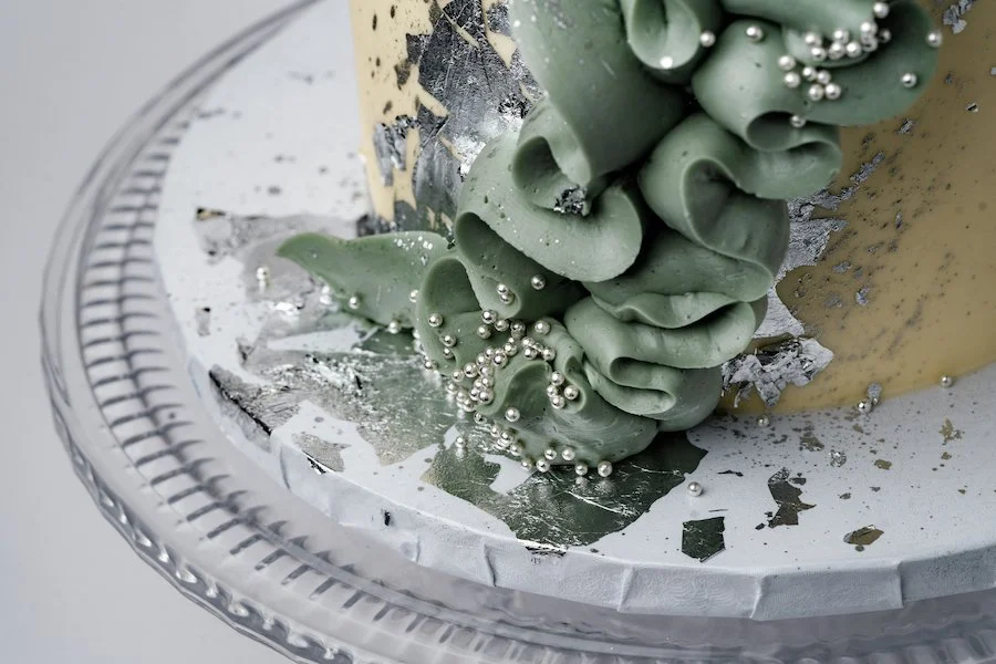 can you freeze buttercream frosting? close-up of a buttercream ruffle on a cake