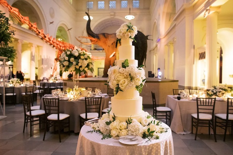 how to tier a cake - tall tiered cake decorated with flowers