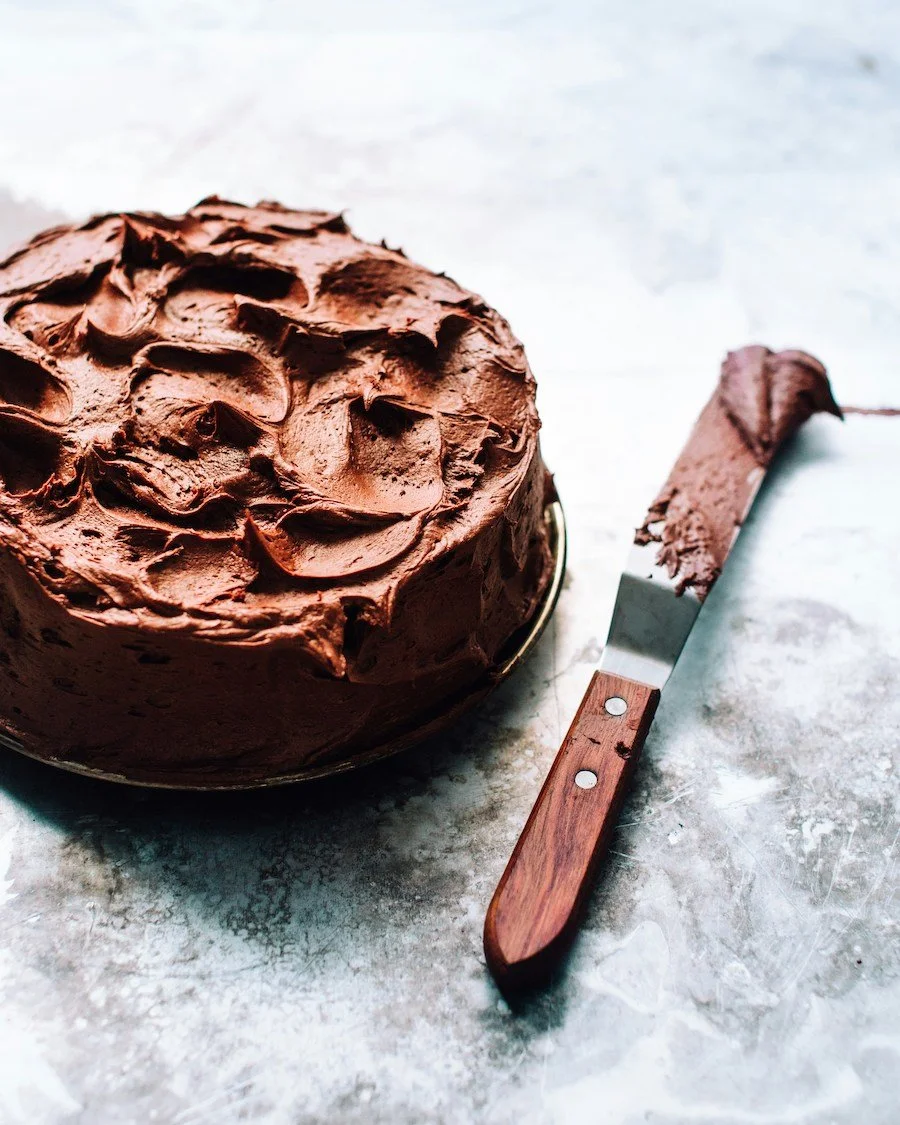 what to substitute for vegetable oil in cake mix - cake frosted with chocolate frosting