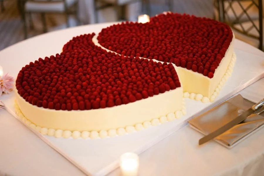 wedding sheet cakes - interlocking heart-shaped sheet cakes with fresh raspberries
