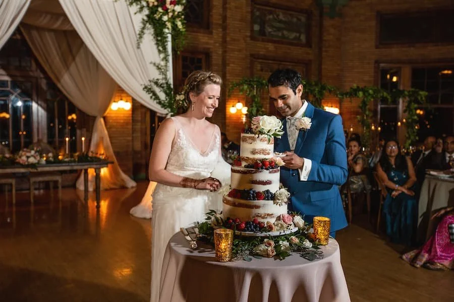 naked cake / naked cakes - couple cutting a naked wedding cake