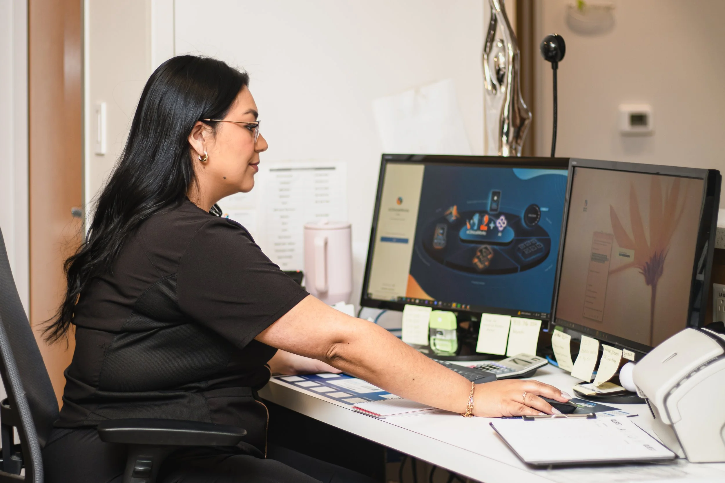 Family Medicine MMC staff working on computer