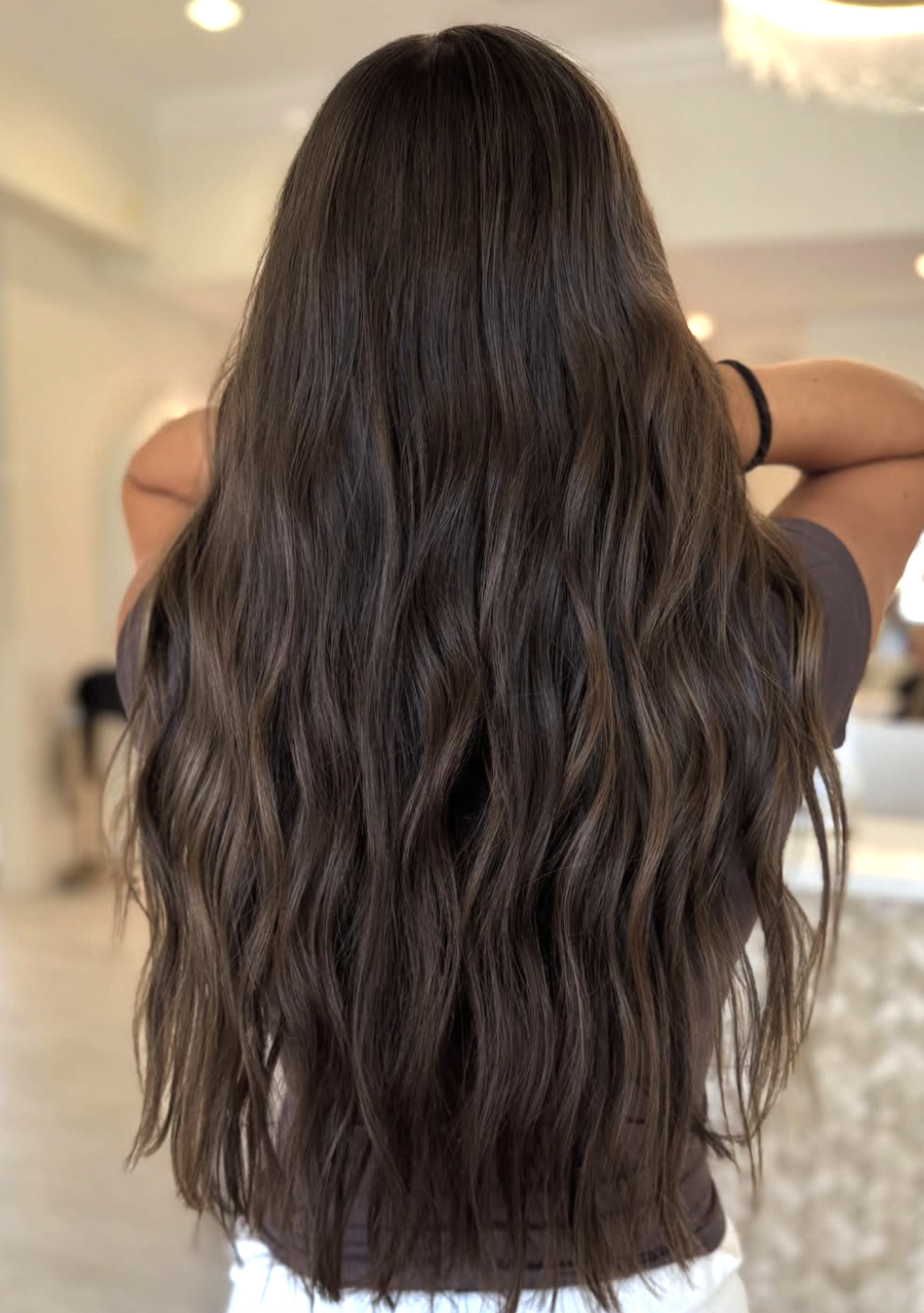 Dimensional brunette hair color at The Loft Salon in Bel Air, MD