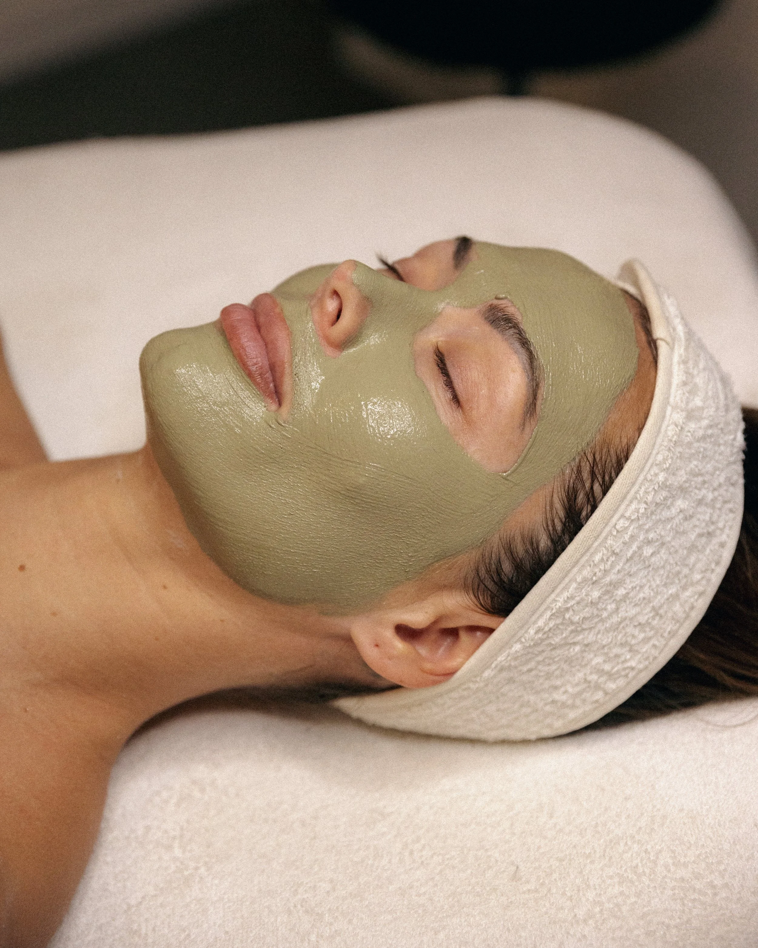 Esthetician performing facial massage in Bel Air, MD