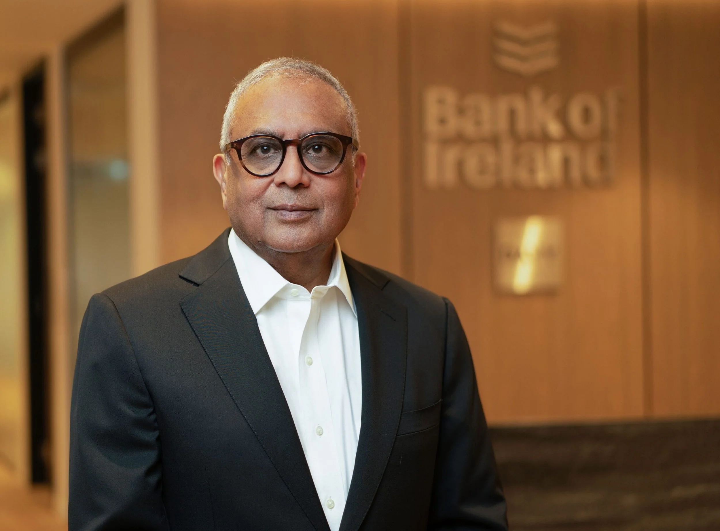 Akshaya Bhargava photographed in front of a Bank of Ireland sign