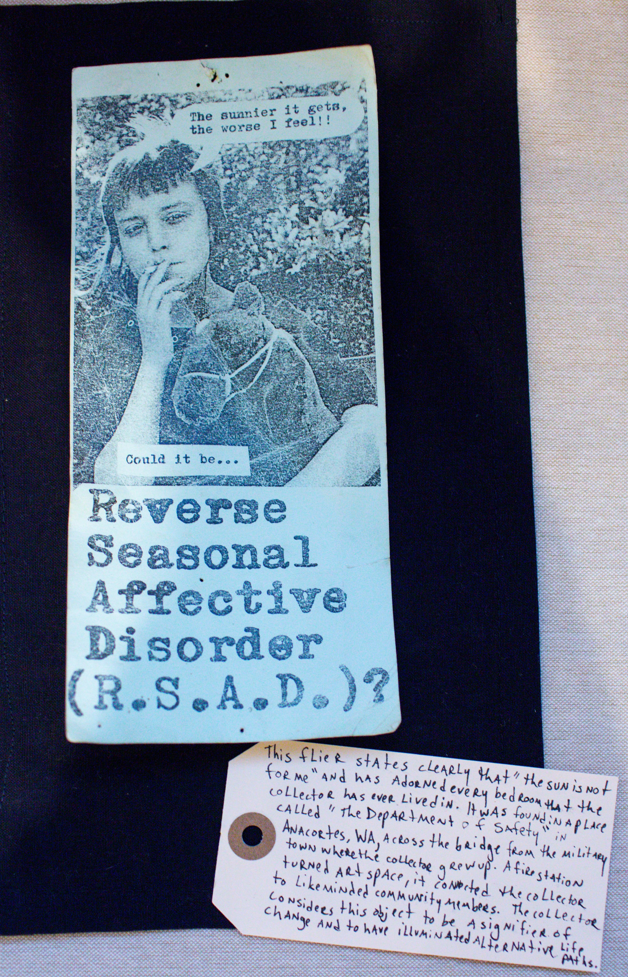 A flyer features a blue-tinted, retro-style photo of a young person with short hair, touching their face, and wearing a hoodie. The flyer text reads: "The sunnier it gets, the worse I feel!" and "Could it be... Reverse Seasonal Affective Disorder (R.