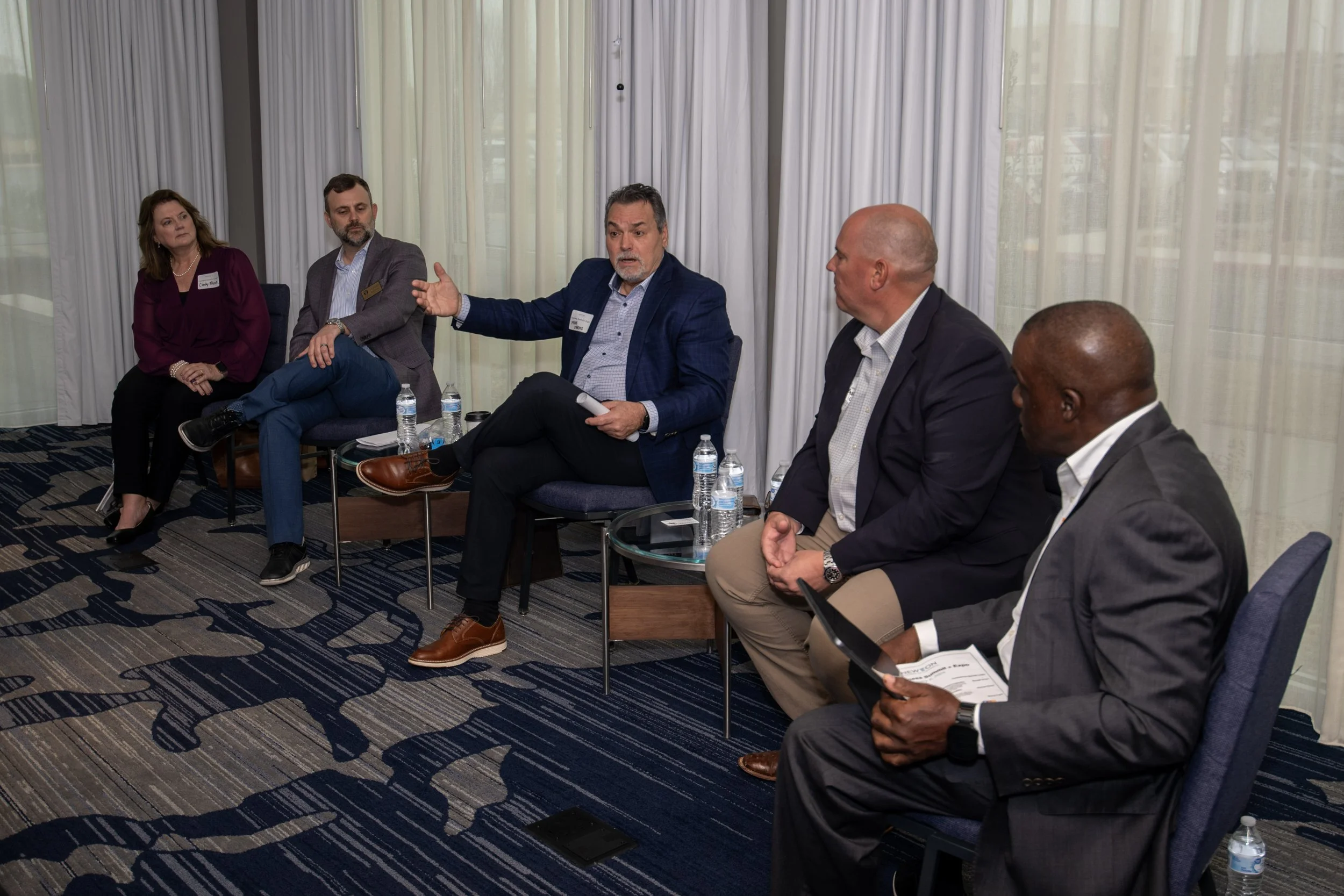 Panelists speaking at Marriott in Covington, GA