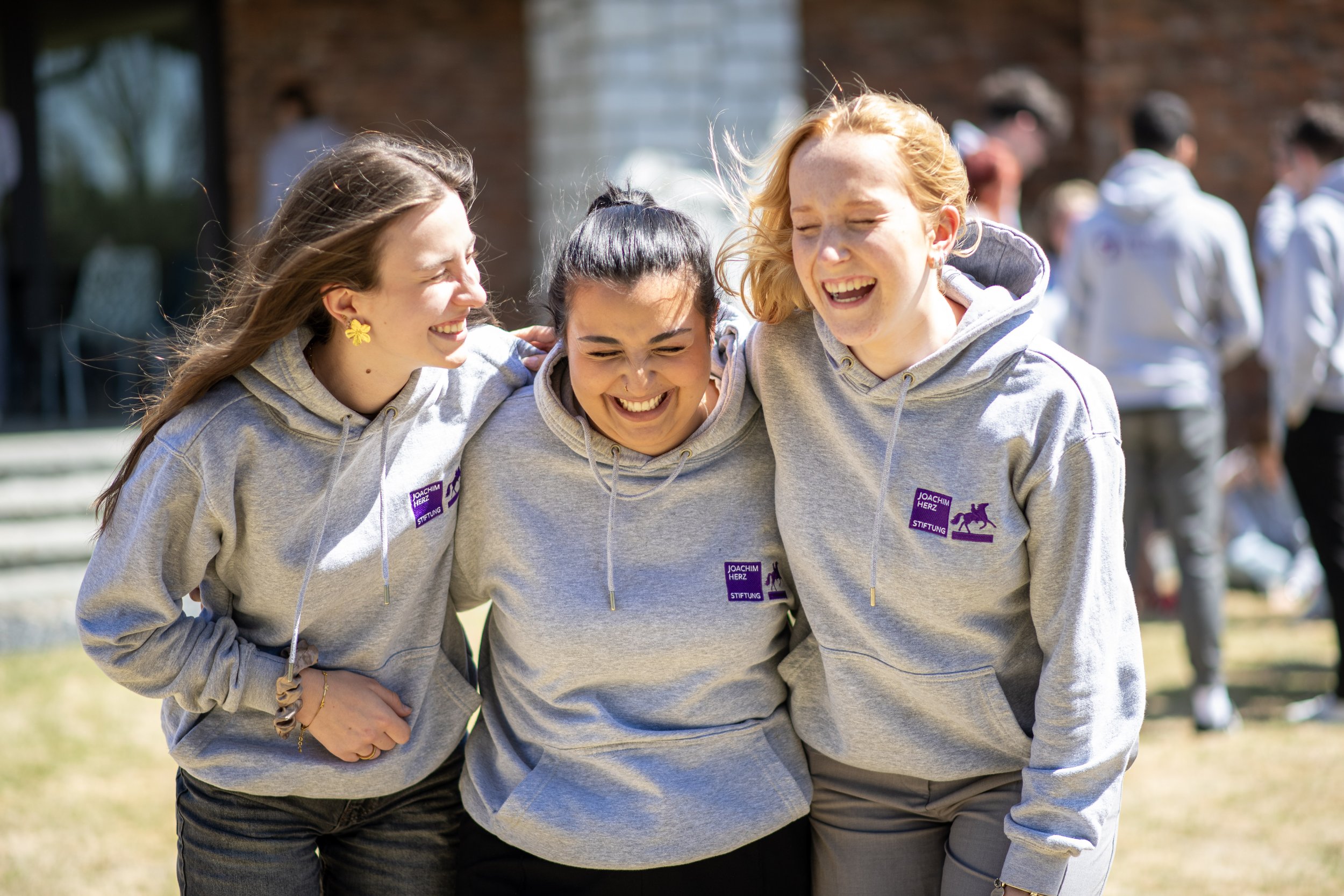 German students laughing at Joachim Herz House located in Covington GA.