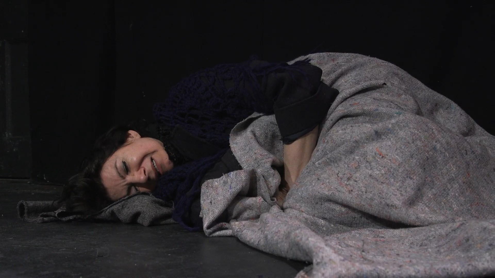 Mother on floor in real pain - Americana.png