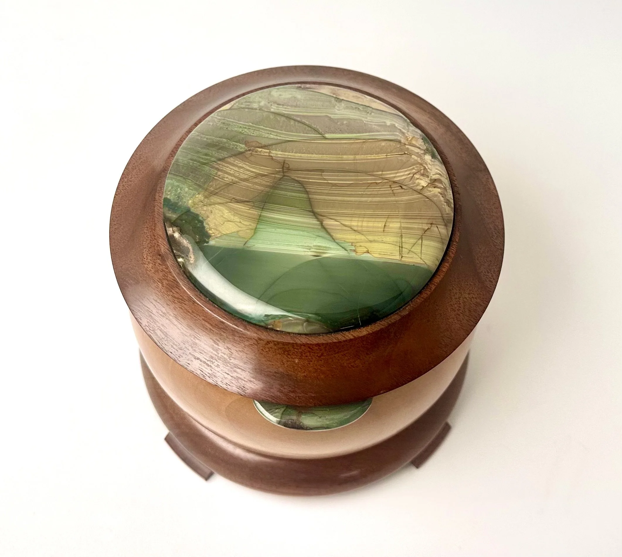 Cherry, walnut, and Blue Mountain jasper. 